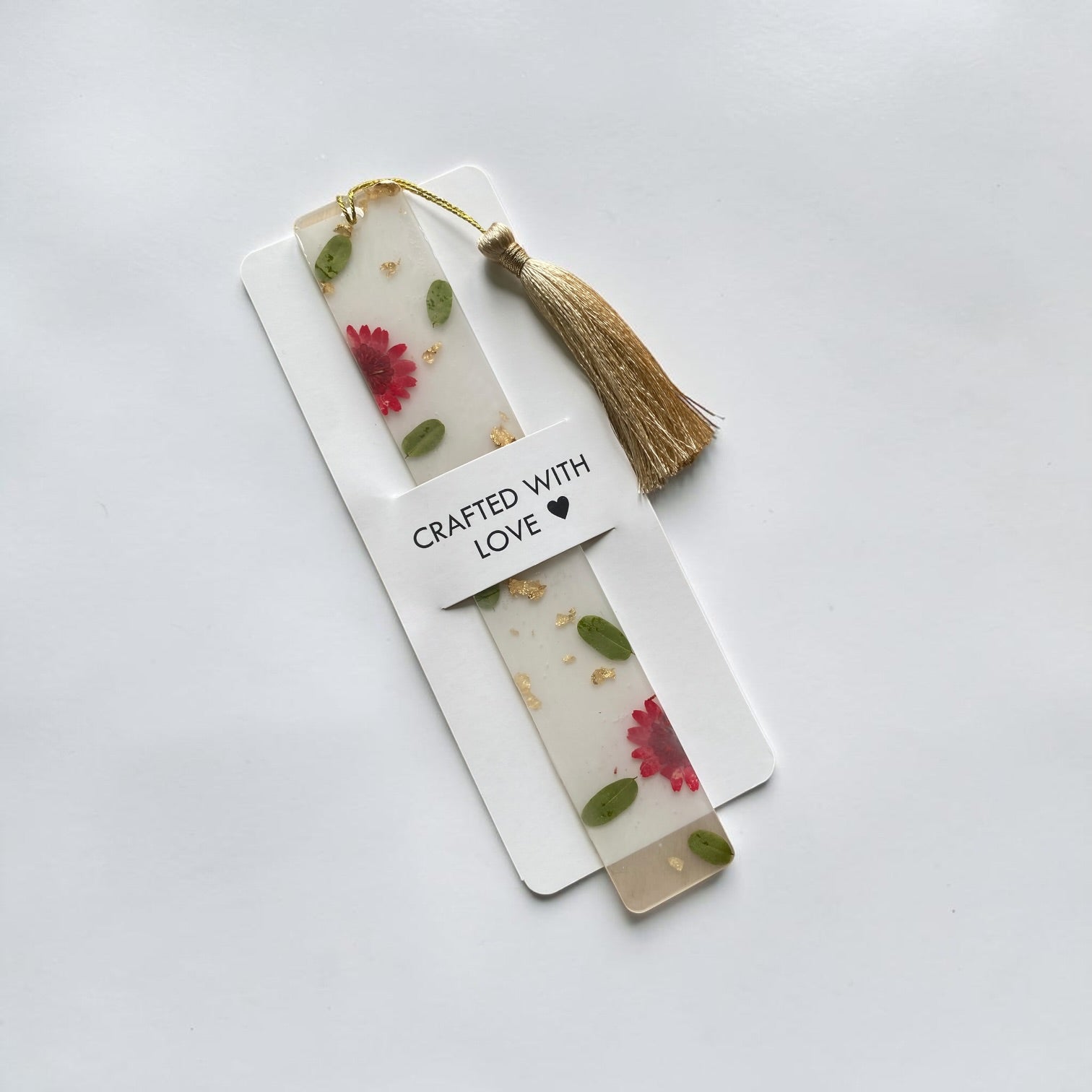 Daisy- fleck- resin- bookmark- with-red- tassel - Resin by Achila