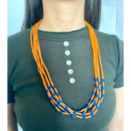 Tan orange with blue beaded necklace - Annie Sakhamo