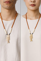 Unisex carved fish pendant- Annie Sakhamo