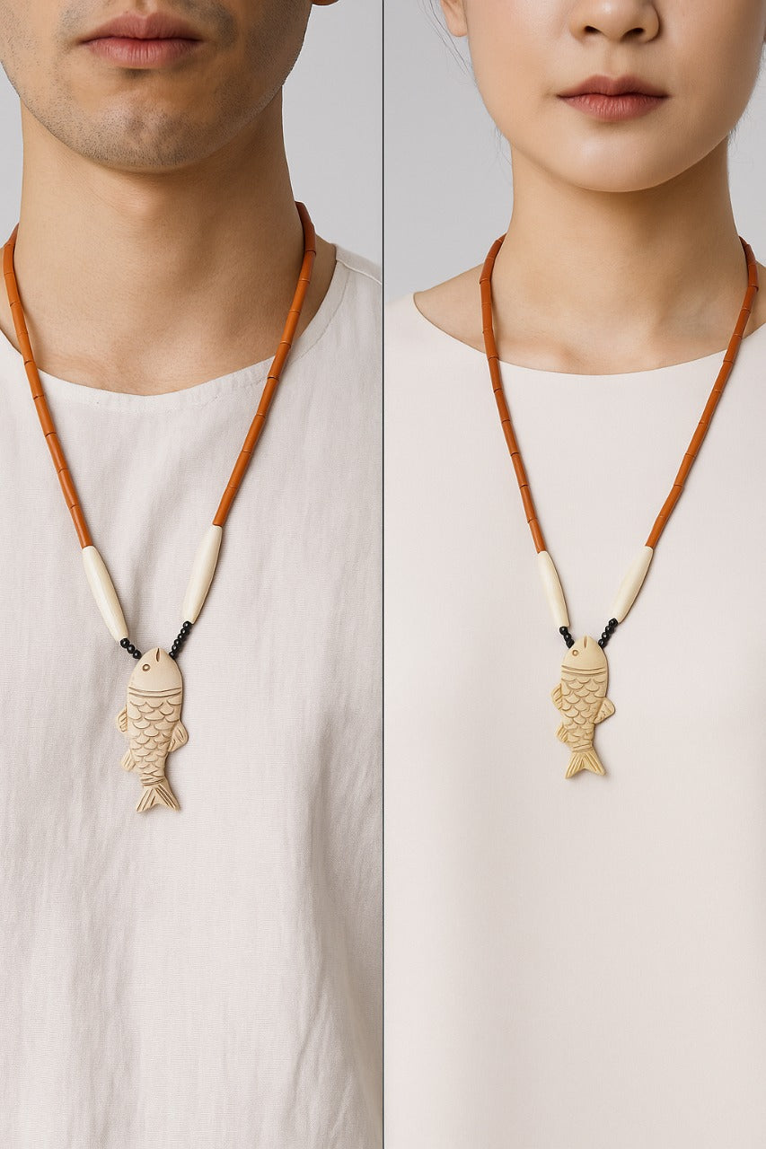 Unisex carved fish pendant- Annie Sakhamo