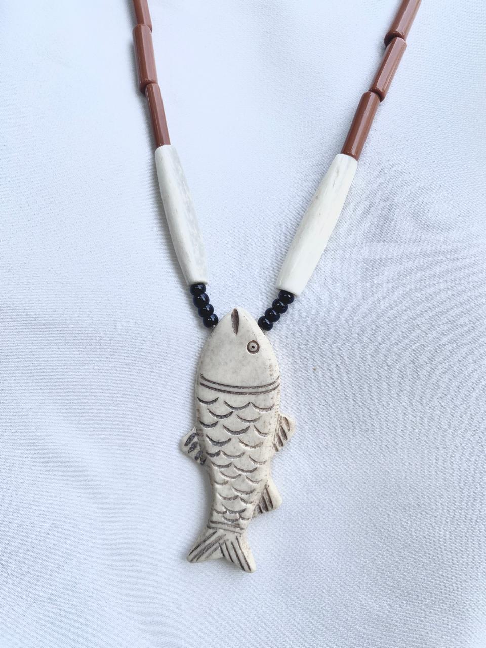 Unisex carved fish pendant- Annie Sakhamo
