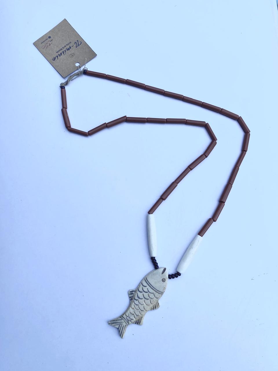 Unisex carved fish pendant- Annie Sakhamo