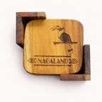 Wooden coaster set with a bird design and 'Nagaland' engraving on a white background