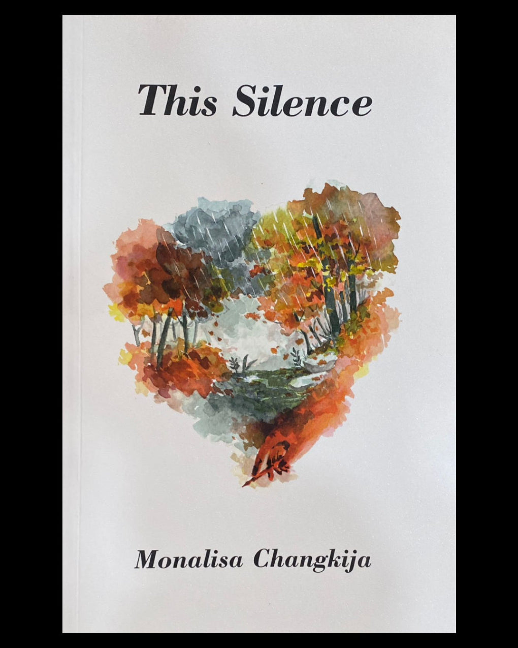 Book cover of 'This Silence' by Monalisa Changkija with a heart-shaped landscape illustration.